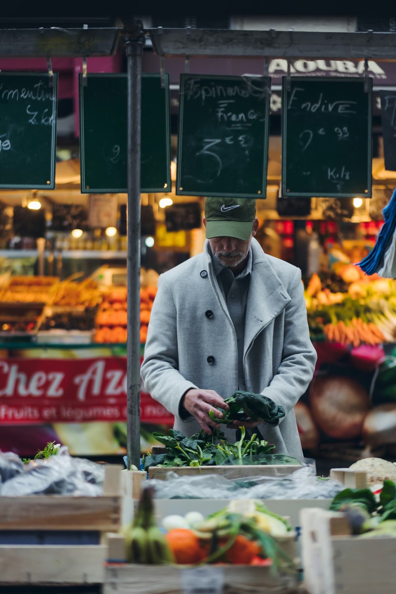 Ohad Amzallag picking spinach at a Paris market